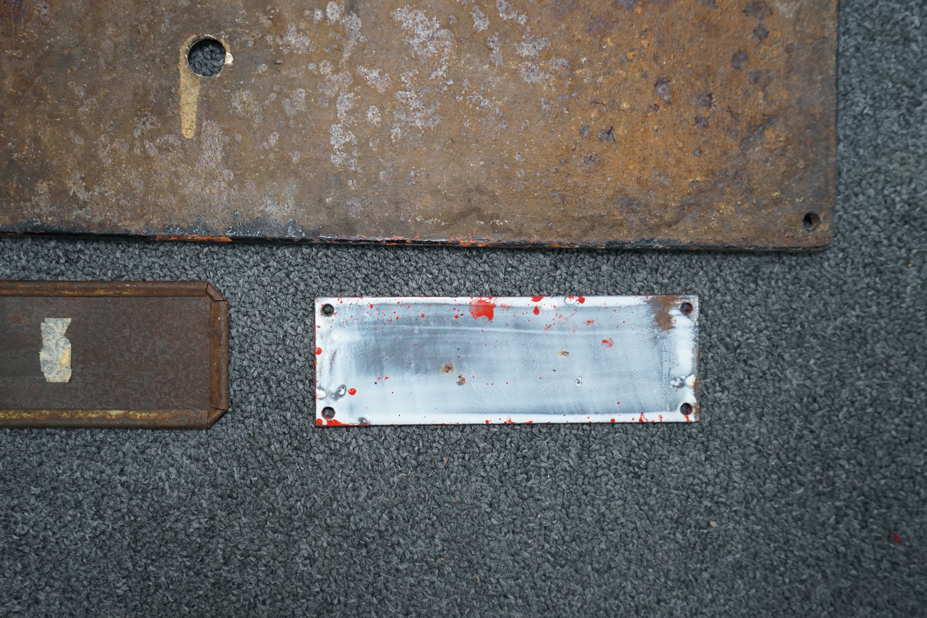 A Great Northern Railway cast iron sign; Trespassers Will Be Prosecuted, 28.5cm x 57cm, together with a WWII A W Bombs Precautions enamelled sign, a Margarine tin sign, a plastic BR Warning sign and a BR enamelled DANGER